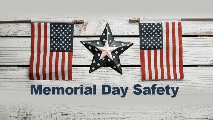 Memorial Day Safety. A metal star between two American flags.