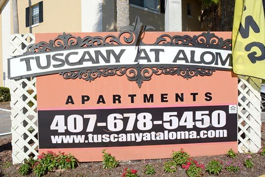 The Tuscany at Aloma Apartments exterior sign.