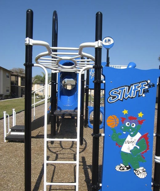 Monkey bars and playground equipment outside of the Tuscany at Aloma rentals.