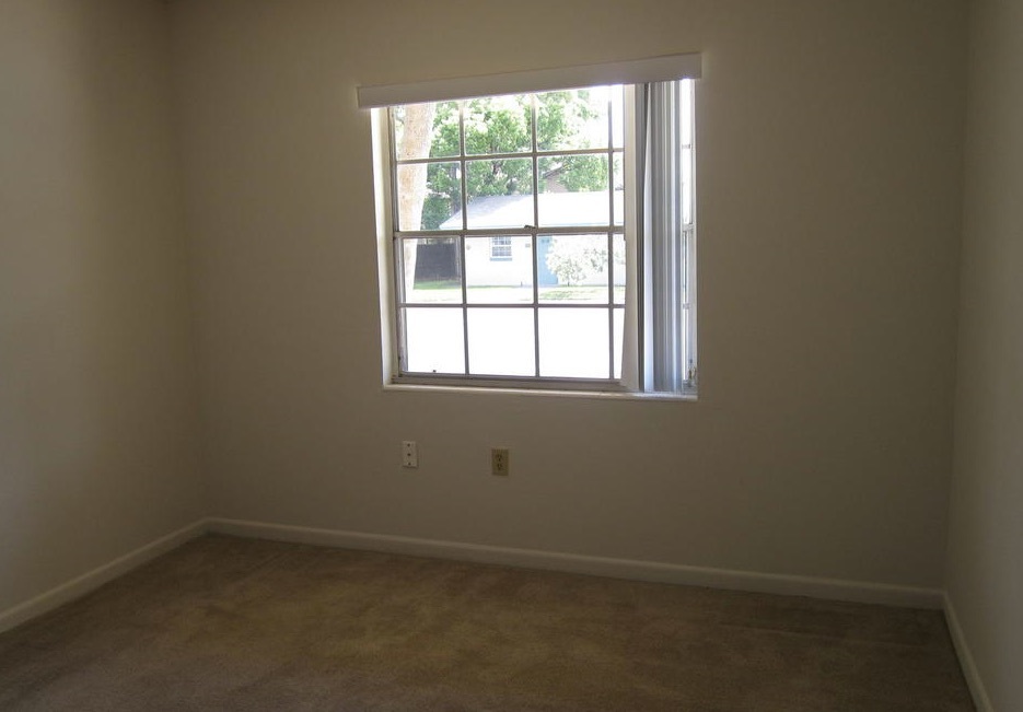 A clean and empty bedroom in the two-bedroom rental.