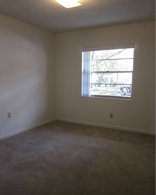 Another clean and empty bedroom in the two-bedroom rental.
