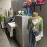 Assorted clothing and household items.