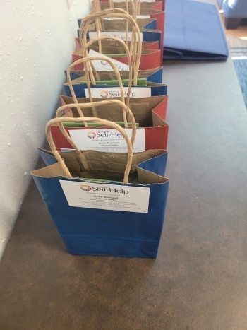 Gift bags on a table.