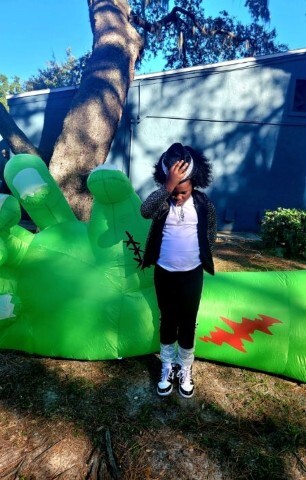 A child dressed as Michael Jackson. 