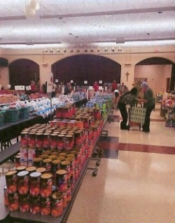 Tables full of groceries for people at Thanksgiving.